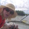 Marlene enjoying her day on the water. 2002
